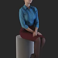 Woman in blue striped shirt and red skirt sitting on white cylindrical seat