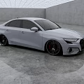 White Audi Sedan with Sporty Alloy Wheels in Modern Showroom Setting Sleek Exterior Design