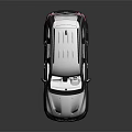 Silver Jeep SUV With Sporty Design Black Wheels Red Brake Calipers And Roof Rack
