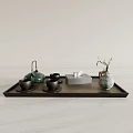 Modern Elegant Tea Set on Wooden Tray with Green Teapot Dark Teacups Vase on Marble Countertop
