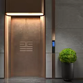 Elegant Modern Elevator Lobby With Bronze Door Geometric Pattern Gray Stone Wall And Green Plant