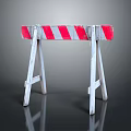 Red And White Striped Road Barrier With White Support Stands On Dark Surface
