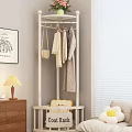Modern Clothing Rack with Hanging Clothes Handbag and Stuffed Toy in Cozy Interior