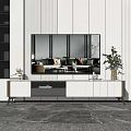 Modern Minimalist TV Stand With White Cabinetry Black Legs Green Plant And Marble Floor