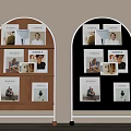 Two Arched Design Bookcases In Brown And Black With Multiple Shelves Holding Magazines