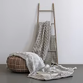 Cozy Home Decor With Knitted Blanket Wooden Ladder And Leather Bean Bag