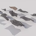 Scattered Curved Wooden Pieces In Gray Brown Tones On Light Background With Shadows