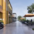 Modern Commercial Building Exterior Landscape With Glass Facade Greenery And Trees