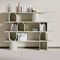 Modern Light colored Multi tiered Bookshelf Featuring Arched Cutouts and Decorative Books