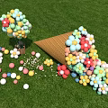 Colorful Inflatable Structures In Various Shapes On Green Grass Field With Cloudy Sky
