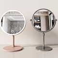 Two Round Lighted Vanity Mirrors With Pink And Silver Stand Bases 3d model