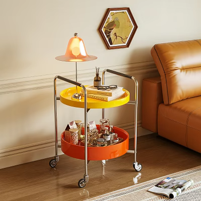 Stylish Rolling Cart With Two Tier Orange Yellow Trays Table Lamp Books And Leather Sofa 3d model