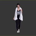 Woman in Black Workout Leggings and Top with White Towel Over Shoulders