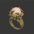 Unique Elegant Decorative Ring With Pink Gemstone And Intricate Metallic Patterns