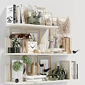 Elegant Decorative Accessories Set on White Shelves with Plants Frames Vases Candles Clock and Books