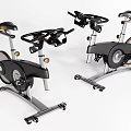 Two Stationary Exercise Bikes With Black And Silver Design For Home Gym Use