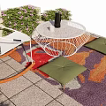 Cozy Outdoor Patio With White Metal Rocker Chair Table Green Plants Colorful Rug And Cushions