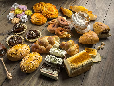 Fresh Assorted Baked Goods With Croissants Bagels Cream Pastries And Meringues On Wooden Table 3d model