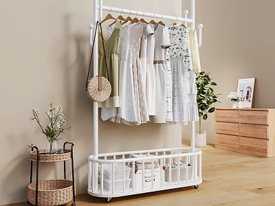 White Wheeled Clothes Rack With Hanging Dresses Bottom Storage Basket And Indoor Green Plant 3d model