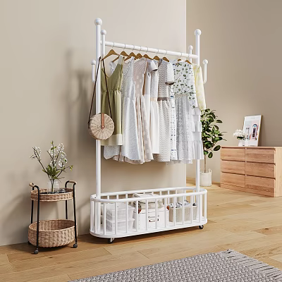 White Wheeled Clothes Rack With Hanging Dresses Bottom Storage Basket And Indoor Green Plant 3d model