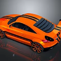 Orange Sports Car With Black Stripes Rear View Sporty Spoiler And Alloy Wheels