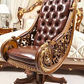 Luxurious Brown Leather Office Chair With Gold Carved Accents Wooden Armrests And Tufted Backrest