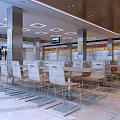 Spacious Modern Cafeteria Interior With Tables Chairs Ceiling Lights And Pillars 3d model