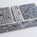 Gray Stone Stepping Stones with Various Patterns and Small Green Grass in Gaps