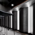 Modern Bar Interior Design With Black Chairs Dark Walls And Strip Lighting