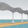 White Wavy Canopy Supported by White Columns Under Blue Sky Over Water With Relaxing Platform