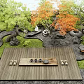 Japanese Courtyard Garden With Wooden Deck Tea Set Stones And Orange Leaf Trees