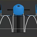 Black Round Dining Table With Four Blue Chairs And Metal Frames