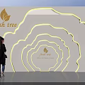 Modern Fresh Tree Themed Background Wall With Layered Curved Design And LED Lighting