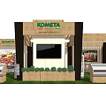 KOMATSU Exhibition Booth With Wooden Structure Green Lawn And Food Display Counters