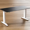 Modern Office Desk With Adjustable Height Black Tabletop And White Legs On Wooden Floor