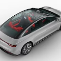 Silver Electric Sedan With Red Seats And Modern Sleek Autonomous Design