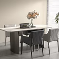 Modern Dining Table With Marble Top Gray Black Chairs Vase Flowers Tray And Green Plant