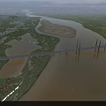 Aerial Landscape Of Wide Muddy River Crossed By Long Bridge Near Green Fields And Towns