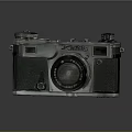 Vintage Silver And Black Electronic Camera With Lens And Knobs
