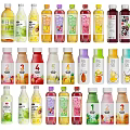 Assorted Bottled Beverages Including Fruit Juices And Tea With Colorful Labels And Various Flavors