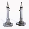 Gray Stone Pillars With Pointed Tops Circular Bases And Hanging Bells 3d model