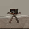 Wooden Side Table with Unique Triangular Legs and Vintage Radio on Top in Modern Room
