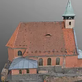 Rural Church Building With Orange Walls Red Tiled Roof Green Steeple And Arched Windows