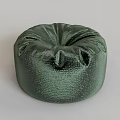 Green Round Bean Bag Chair With Shiny Metallic Texture And Pleated Surface For Comfortable Seating