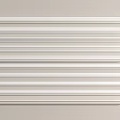 White Gypsum Mouldings Neatly Arranged On Light Colored Background For Interior Design