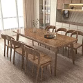 Wooden Dining Table Set With Four Chairs Vase And Tray In Bright Room