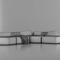 Modern Beige Modular Sectional Sofa With Brown Cushions And Dark Blue Blanket