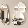 Unique Shaped Mirrors In Modern Living Room Reflecting Sofa Plant And Furniture Decor