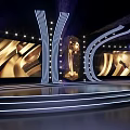 Elegant Modern Awards Stage With Golden Trophy Large Golden Screens And Curved Lights
