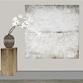 Textured Abstract Painting On Wall With White Flowers In Vase And Wooden Pedestal